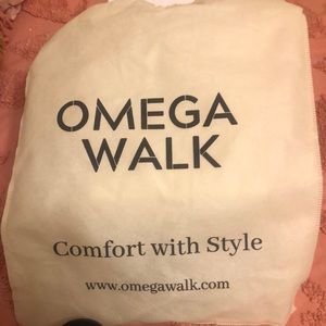 Women walking shoes sizes 9.5 black in color brand new never worn.